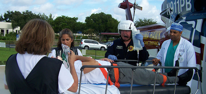 A patient being wheeled out of the Trauma Hawk on a gurney