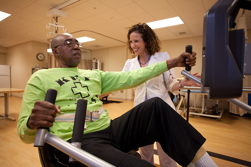 Healey Center resident performing rehabilitation exercises