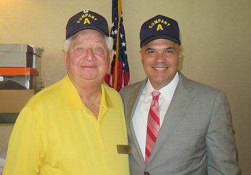 Marvyn Garber and Chris Irizarry both wearing Company A hats