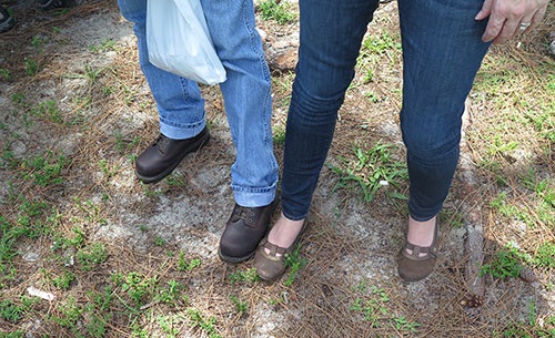 Tom and Darcy put their shoes side by side