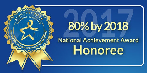 Ribbon with text to the right that reads 80 percent by 2018. National Achievement Award Honoree