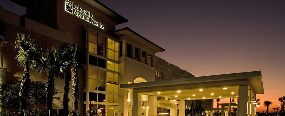 The front of the Lakeside Medical Center building at night