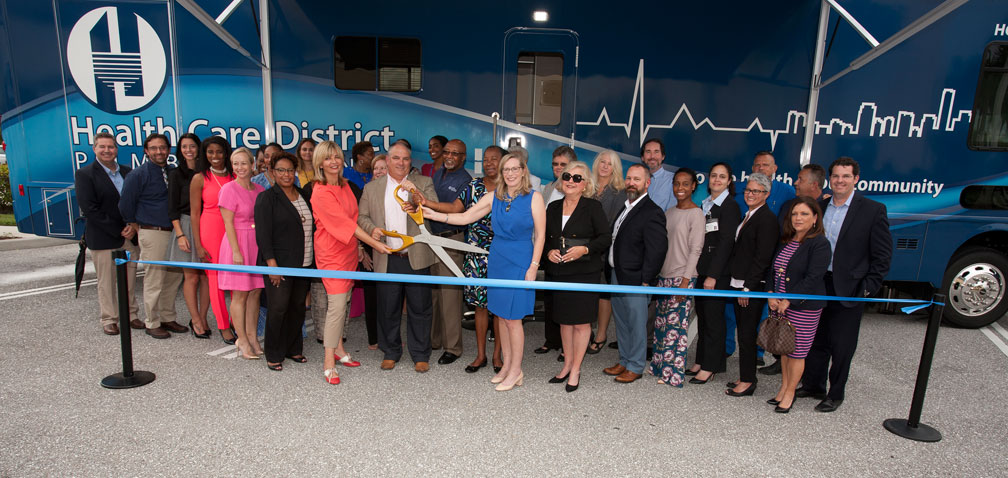 Health Care District Staff and Partners Cutting the Ribbon