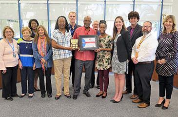 Image of the C. L. Brumback Clinic Staff Receiving Recognition from AHA