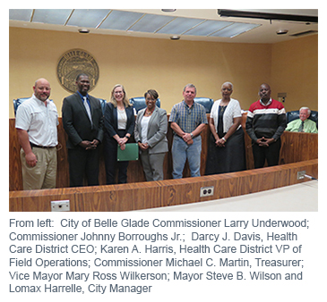 From left: City of Belle Glade Commissioner Larry Underwood; Commissioner Johnny Borroughs Jr.; Darcy J. Davis, Health Care District CEO; Karen A. Harris, Health Care District VP of Field Operations; Commissioner Michael C. Martin, Treasurer; Vice Mayor Mary Ross Wilkerson; Mayor Steve B. Wilson and Lomax Harrelle, City Manager