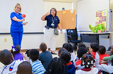 Dental Staff teaching students at PEPPI Head Start