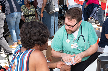 Bahamian evacuee being treated