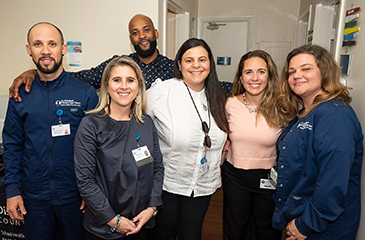 Group photo from the Addiction Stabilization Center Ribbon Cutting