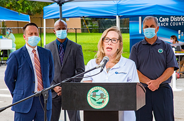 Darcy J. Davis speaking at the Scout Mobile Unit Press Conference