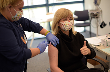 Dr. Andric receives vaccine