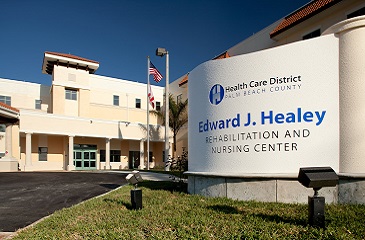 Exterior of Edward J Healey Center and signage
