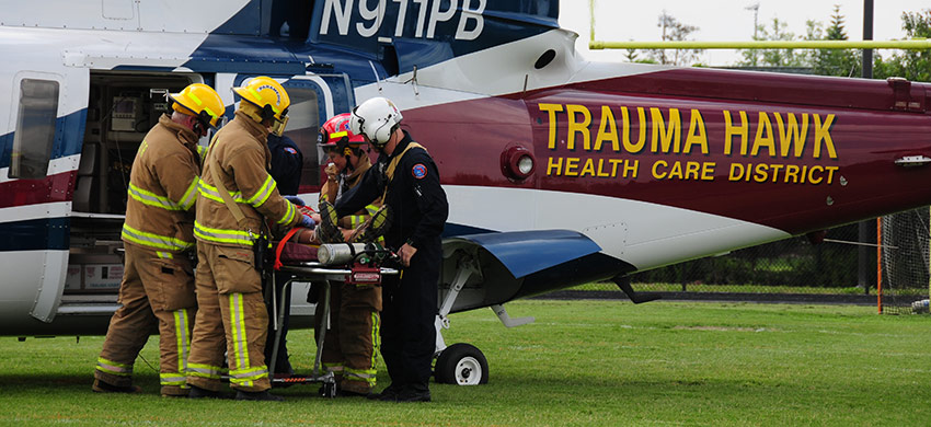 A patient being loaded into the Trauma Hawk on a gurney